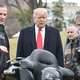 Harley CEO Matt Levatich, left, with President Trump at the White House in February 2017.